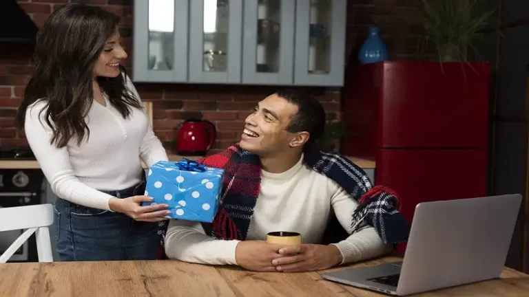 beautiful-woman-surprising-man-with-gift-ezgif.com-optiwebp
